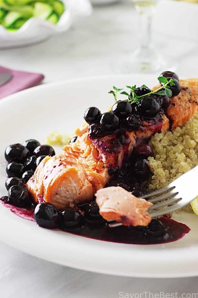 A fork showing a bite of king salmon.
