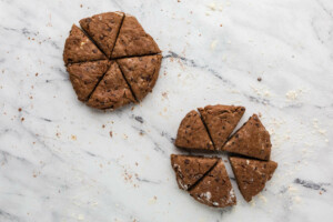 Slicing scones from the chocolate dough.